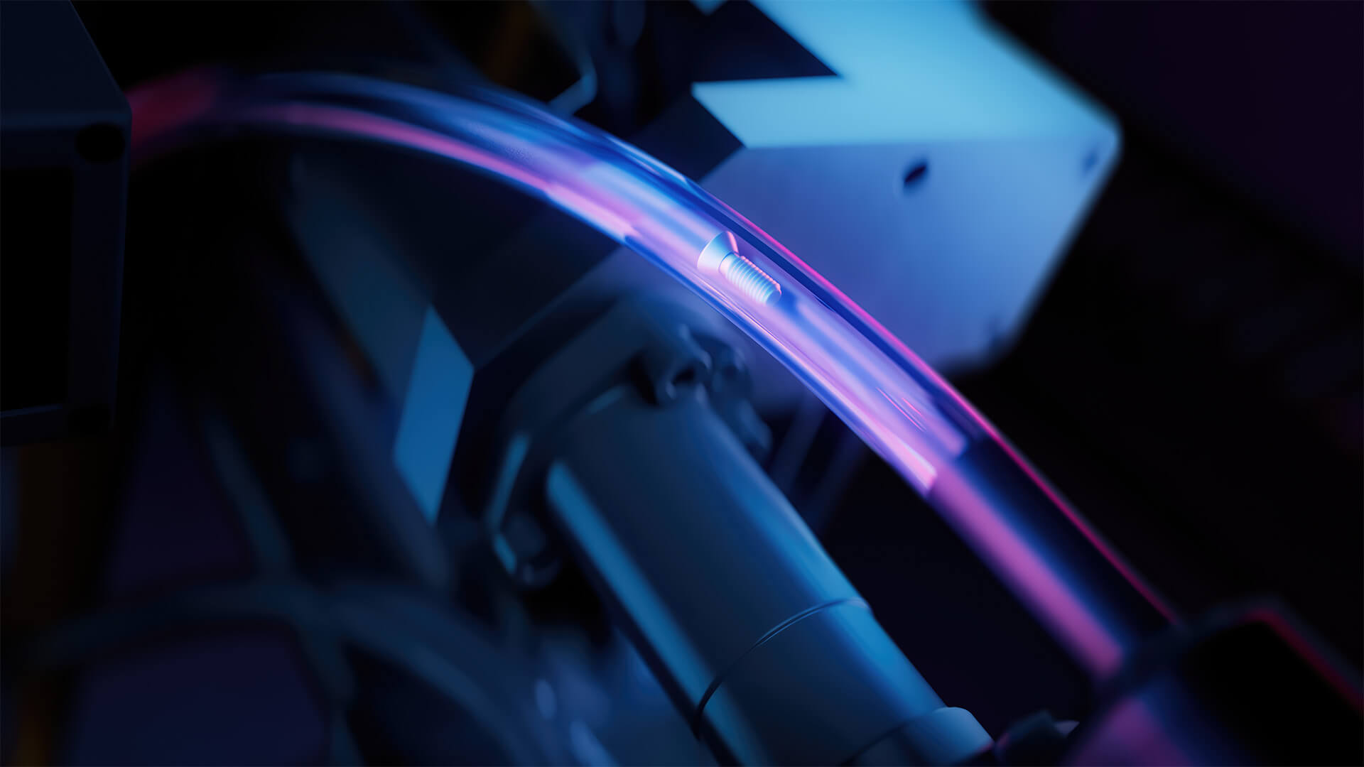 Industrial automation detail with transparent tube and illuminated bolt under blue and purple lighting